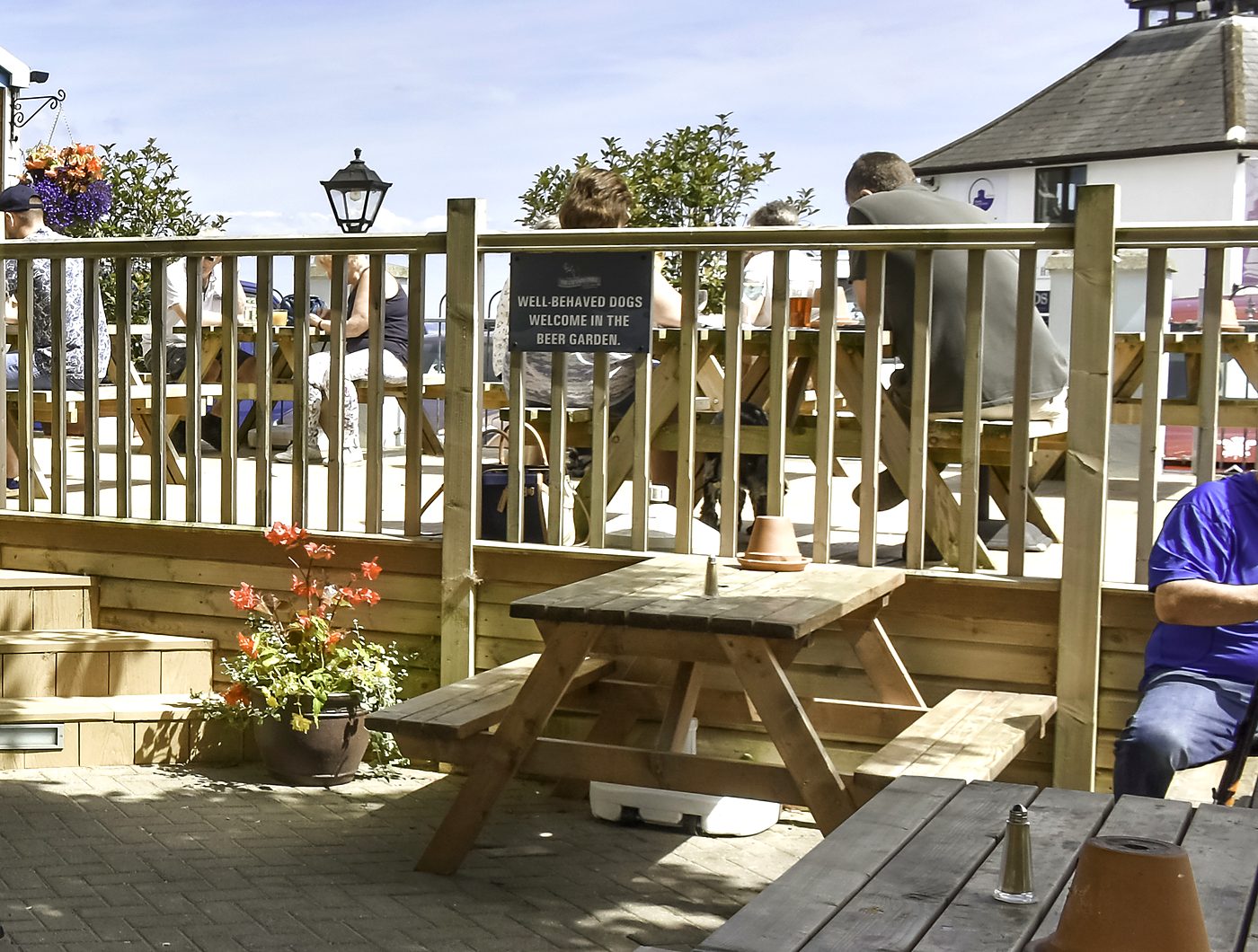 Well-behaved dogs welcome sign in the Captains Table beer garden, Saundersfoot